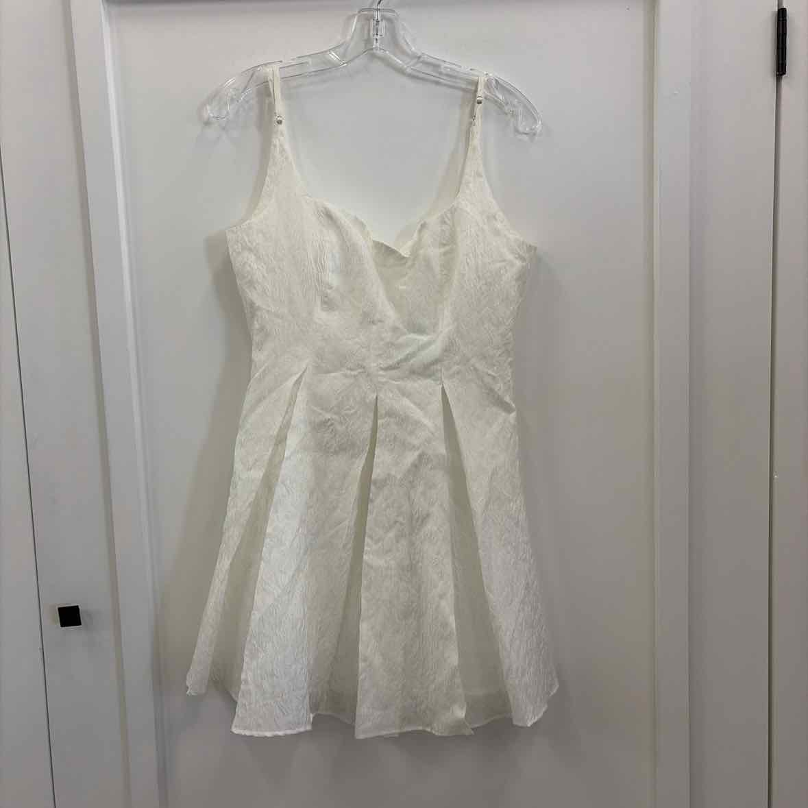 Designed in textural jacquard fabric, Astr the Label's flared mini dress makes