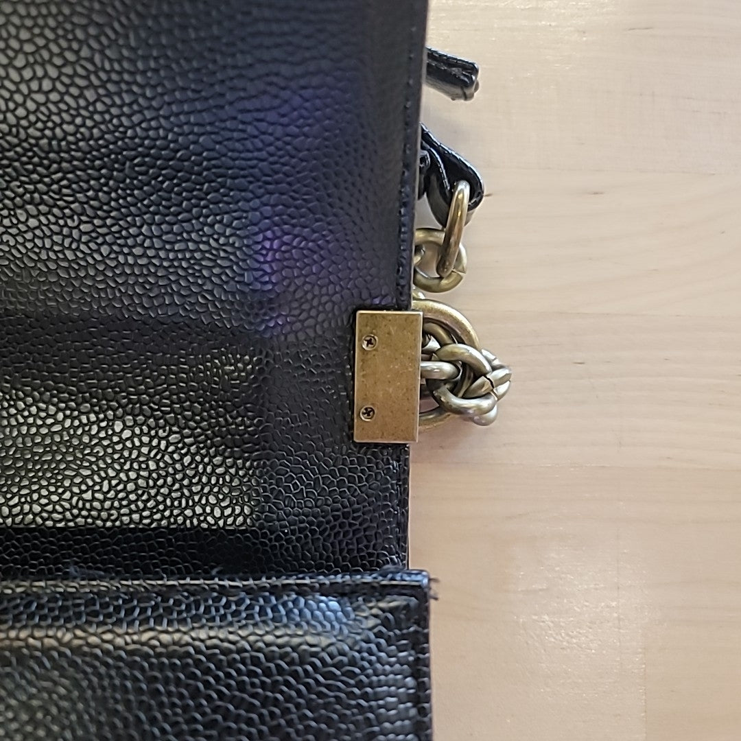 Chanel Large Boy Bag in Black Pebbled Leather with Antique Gold Tone Chain Strap