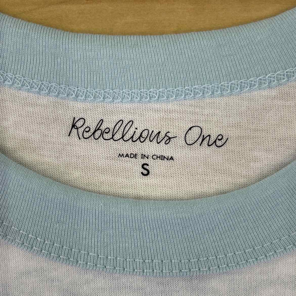 Rebellious One Juniors' Orange Graphic Short-Sleeve T-Shirt - White/Baby Blue