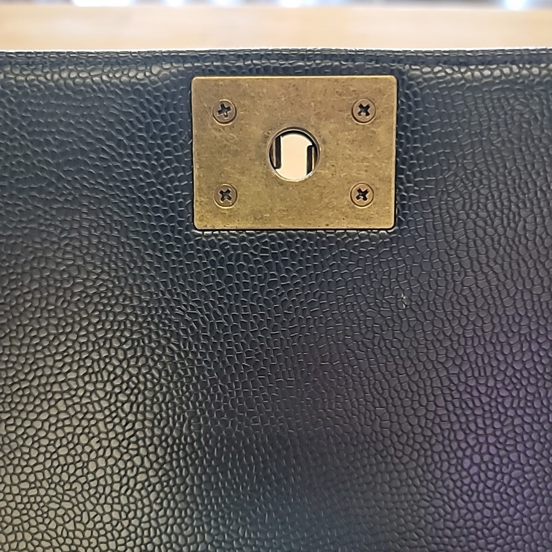 Chanel Large Boy Bag in Black Pebbled Leather with Antique Gold Tone Chain Strap