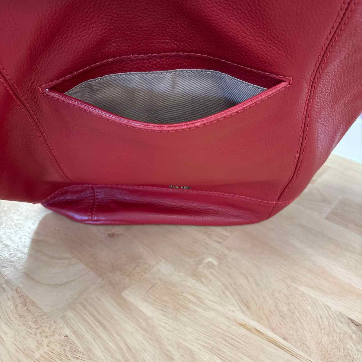 The Sak Red Pebbled Leather Preloved Handbag