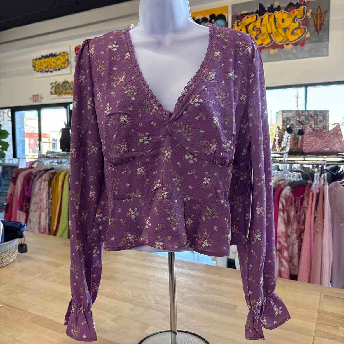 Celebrity Pink Juniors' V-Neck Printed Peplum Long Sleeve Top