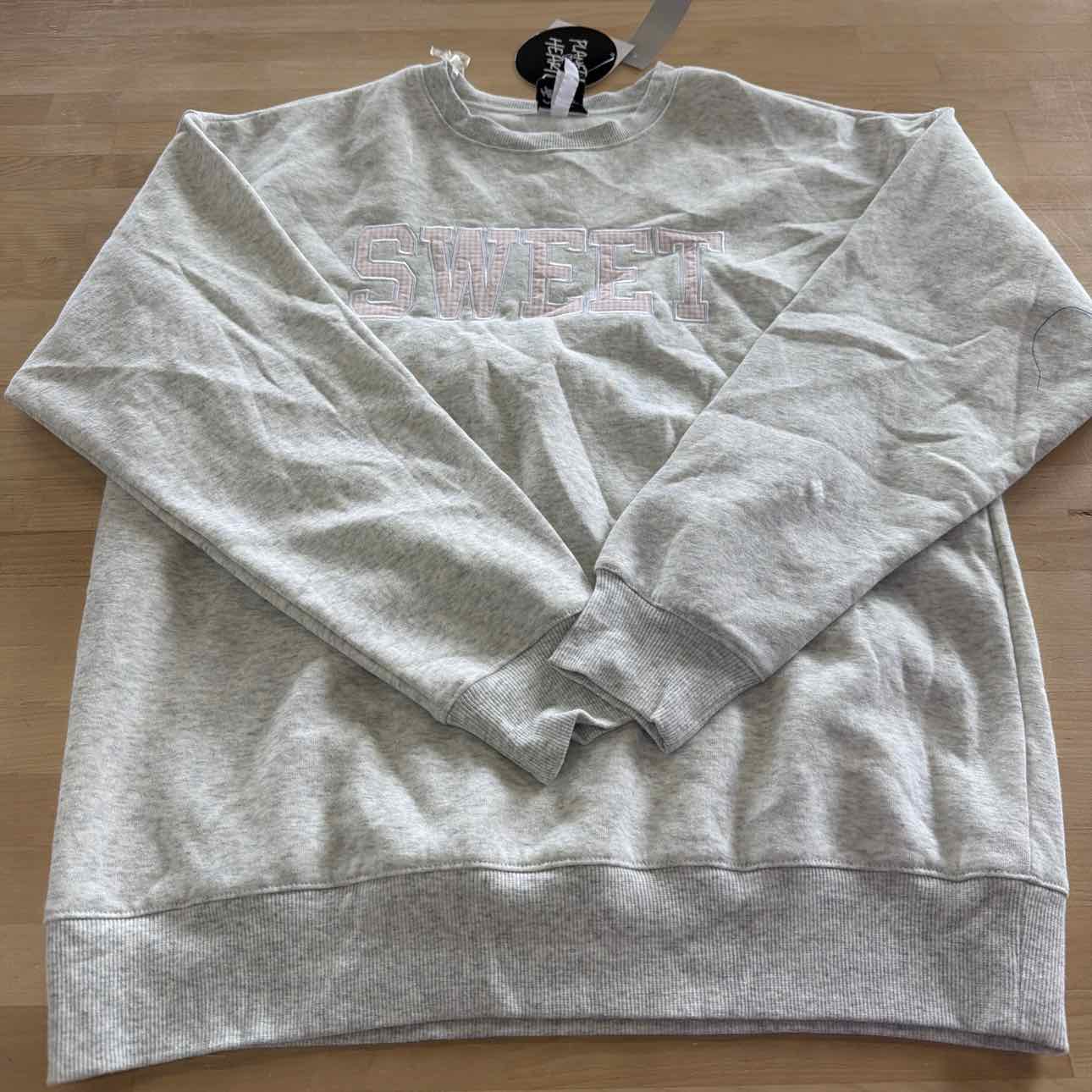 Planet Heart Juniors' Embroidered Fleece Crewneck Sweatshirt