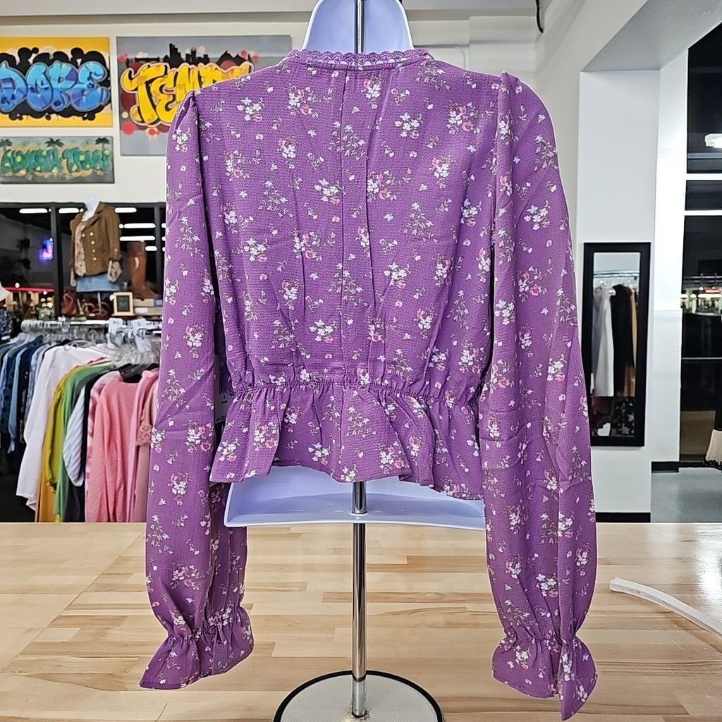 Celebrity Pink Juniors' V-Neck Printed Peplum Long Sleeve Top
